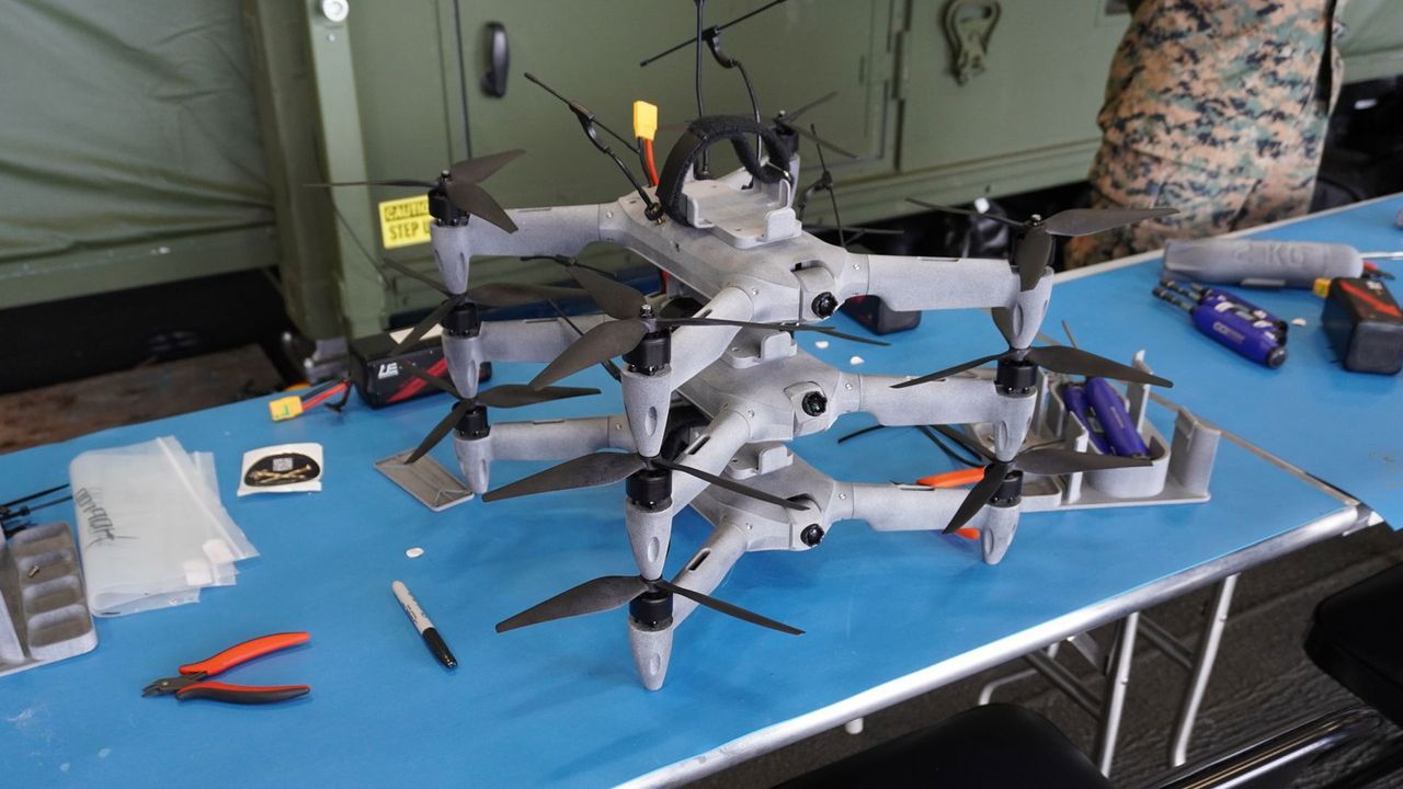 Featured image US Navy prints combat drones aboard carrier in rough seas